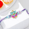 Fluorescent Enamel Ganesha Charm Rakhi Online